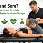 A man assists a woman in stretching her leg on a massage table, with icons and text promoting professional stretch & recovery sessions.